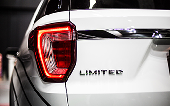 Emblem on rear of white SUV