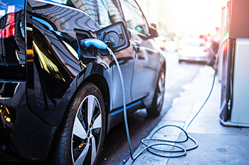 Electric car charging on a terminal.