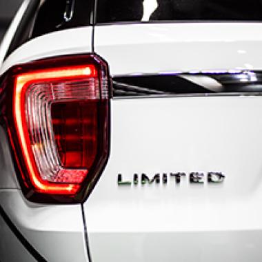 Emblem on rear of white SUV