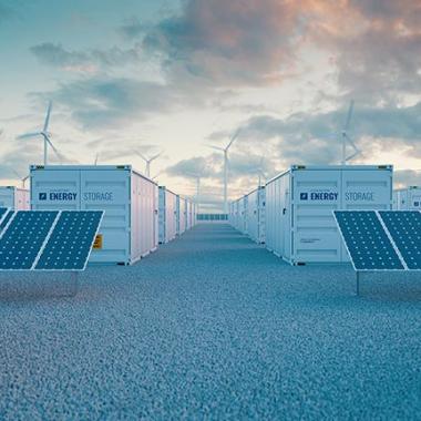 Battery storage power station accompanied by solar and wind turbine power plants.