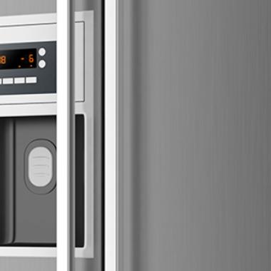 Modern appliances featuring a freezer and refrigerator.