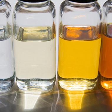 Bottles of Oil in Sunlight | Saint-Gobain Tape Solutions