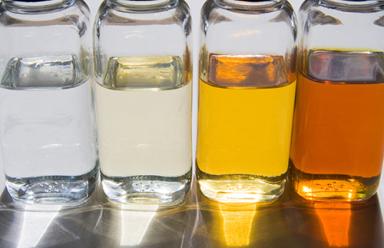Bottles of Oil in Sunlight | Saint-Gobain Tape Solutions
