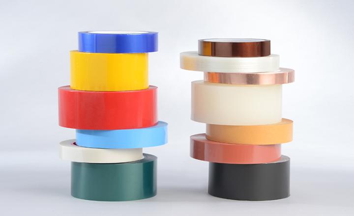 Rolls of multi-colored h-old® Adhesive Tapes