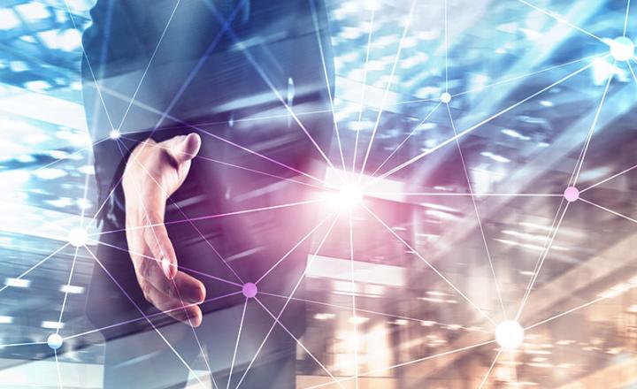 Blockchain network featuring a hand on blurred skyscrapers background