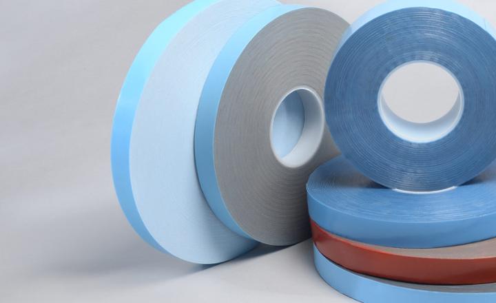 Rolls of bonding tape stacked