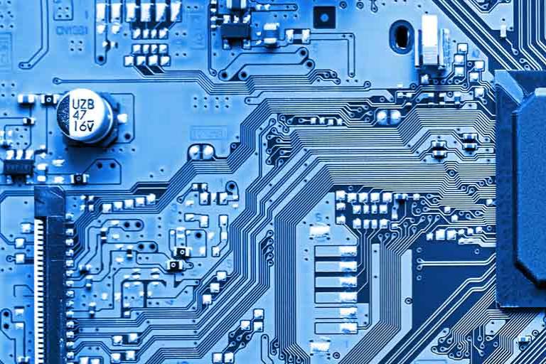 Detail of blue electronic microchip circuit board.