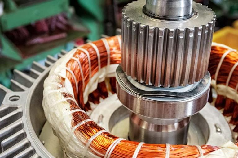 Detail of electric motor being assembled.