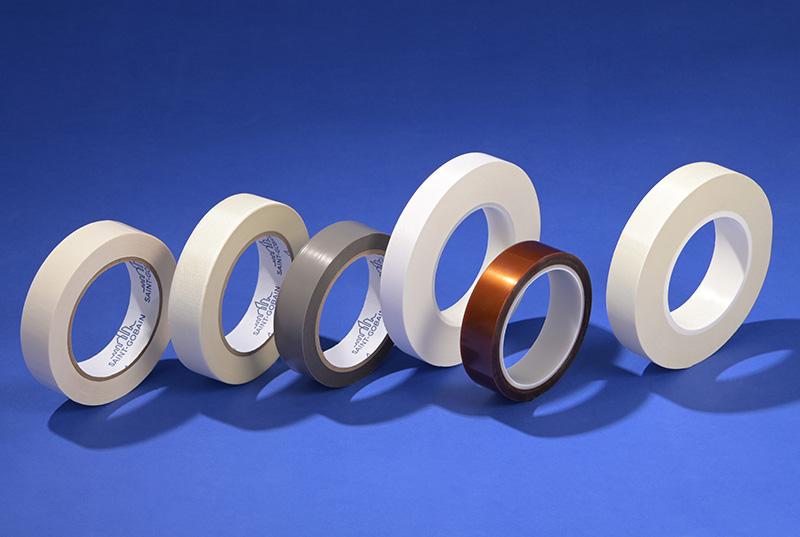 Several rolls of electrical insulation adhesive tape in a row