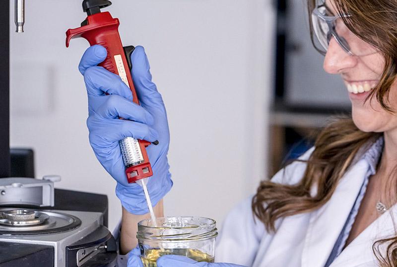 A Saint-Gobain Research and Development engineer performing test in a laboratory