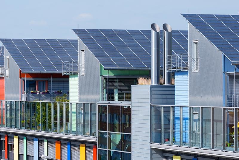 Residential housing with solar panels on the roofs