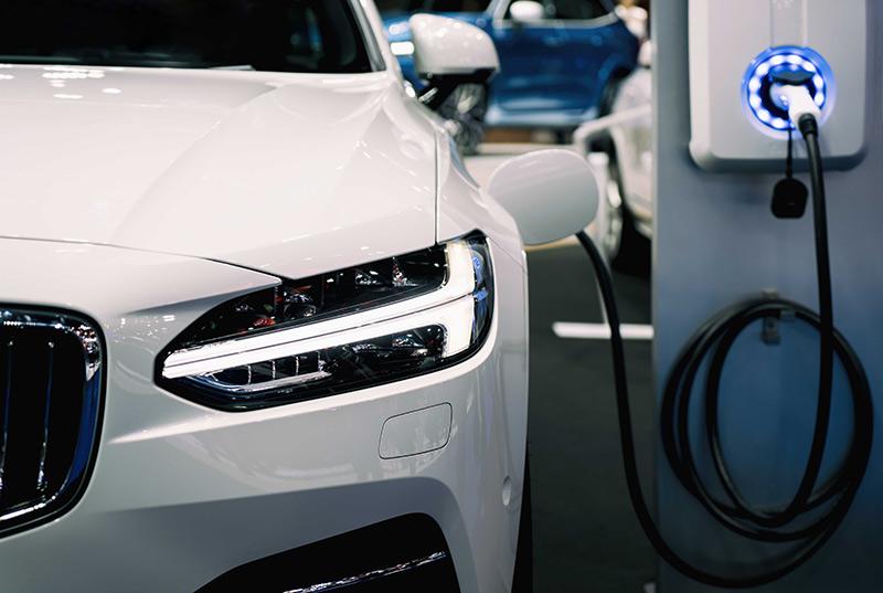 White electrical car charging.